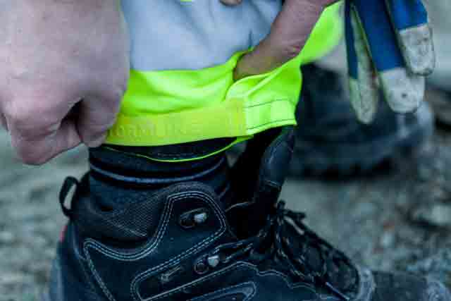 adjustable velcro ankle tab on waterproof workwear